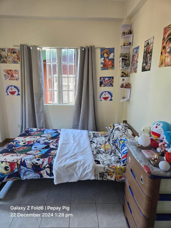 Ένα ή περισσότερα κρεβάτια σε δωμάτιο στο Baguio Transient Homestay Rm 1 Near Igorot Stone Kingdom