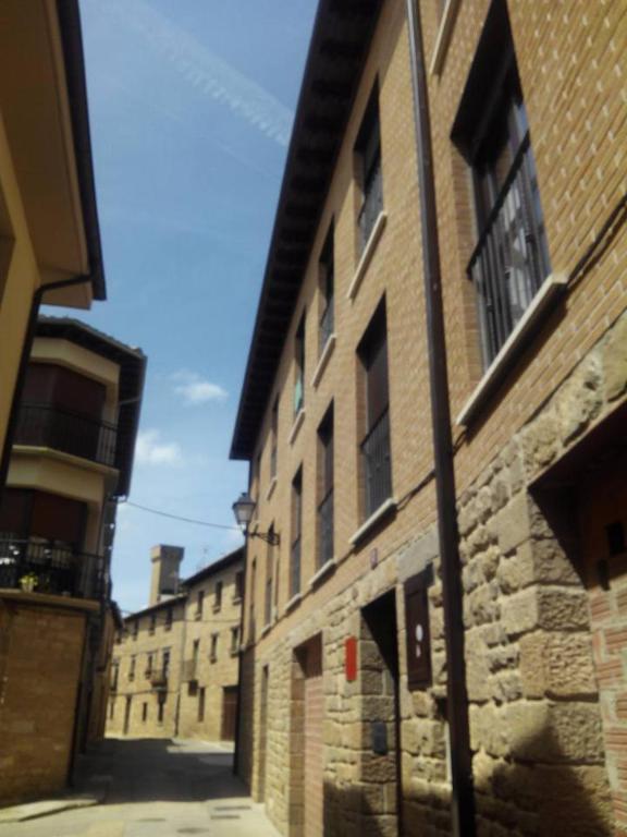 an alley in an old brick building at Apartamento La Rueda in Olite