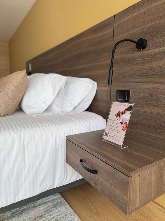Postel nebo postele na pokoji v ubytování Entrenevados Hotel