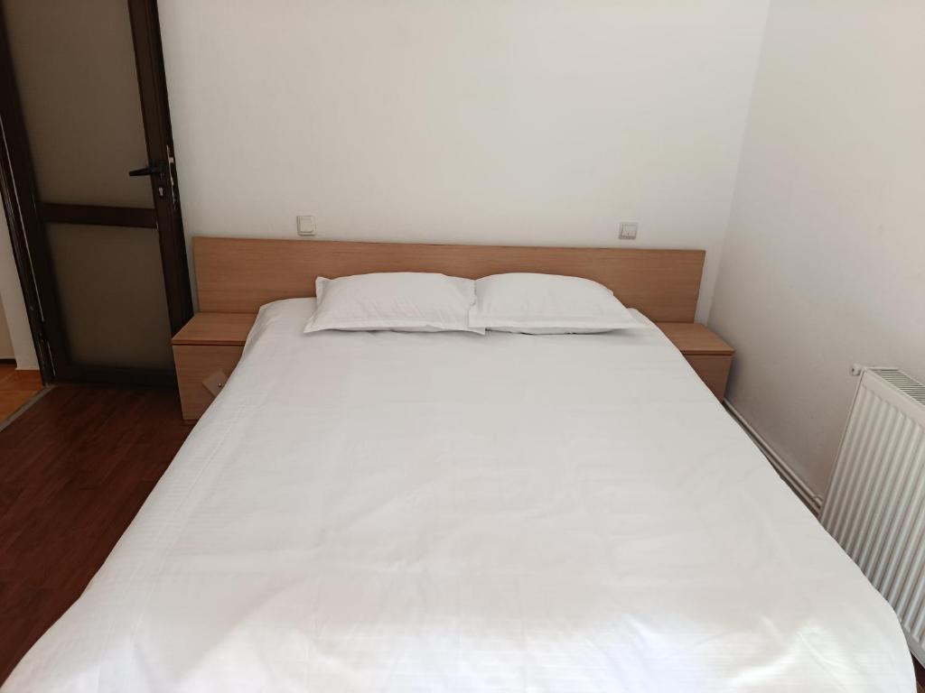 Postel nebo postele na pokoji v ubytování Complex Adela Transfăgărășan