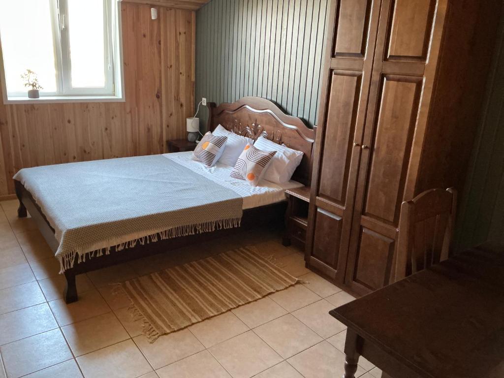 Postel nebo postele na pokoji v ubytování Olimpia Hotel&Spa