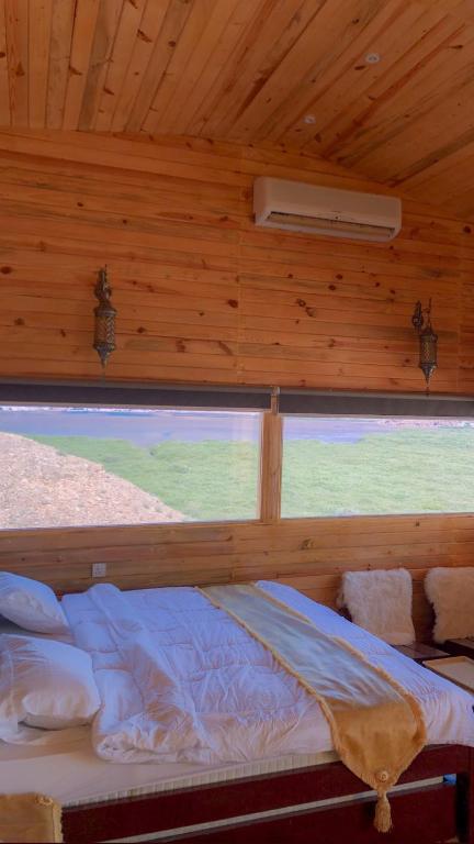 Postel nebo postele na pokoji v ubytování Dew Hut