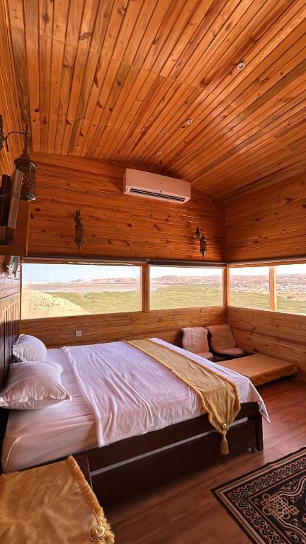 Postel nebo postele na pokoji v ubytování Dew Hut
