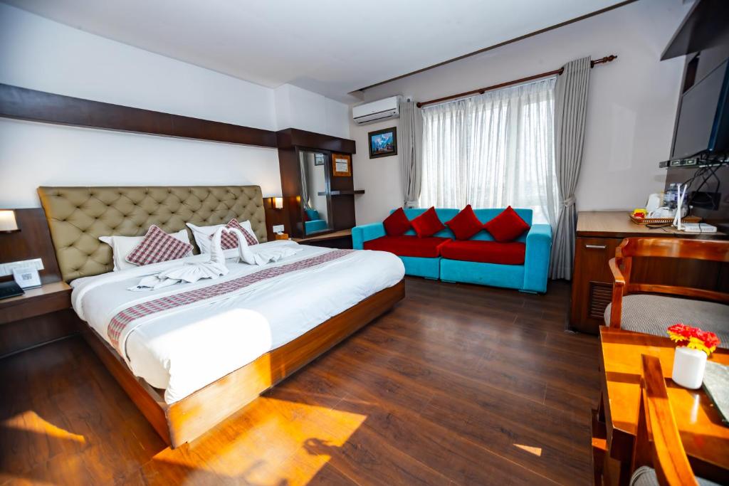Postel nebo postele na pokoji v ubytování Kathmandu Suite Home