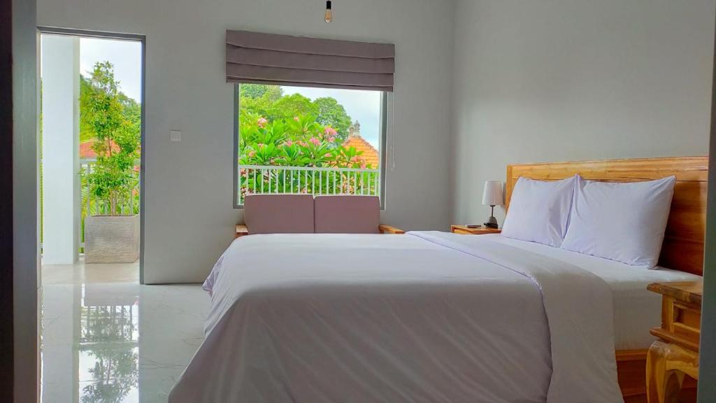 Una cama o camas en una habitación de Aleenka House