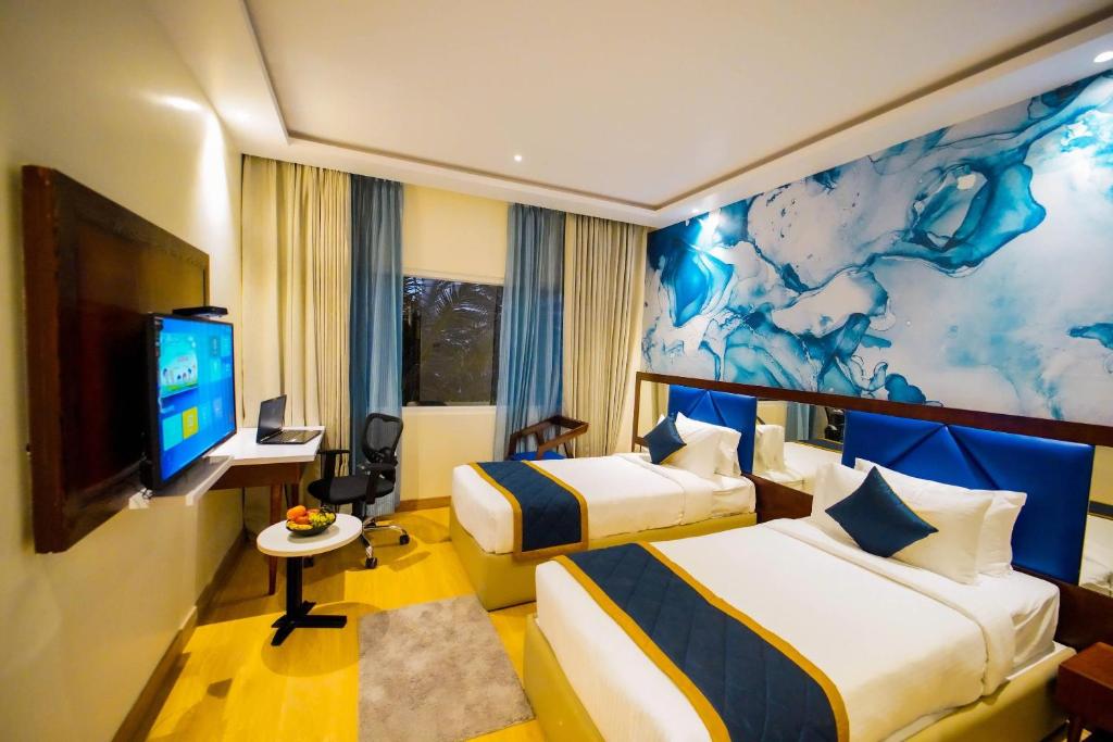 TV a/nebo společenská místnost v ubytování Quality Inn Rockwell Grand, Bangalore