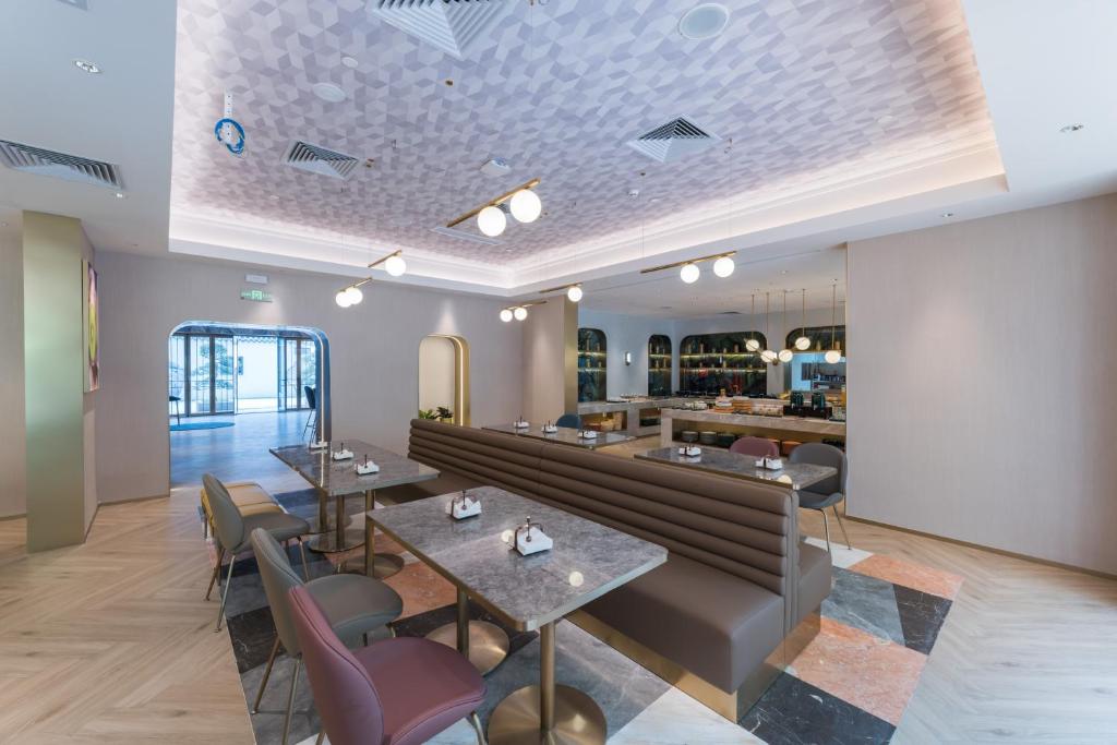 Posezení v ubytování Manxin Hotel Guangzhou Baiyun Airport Branch