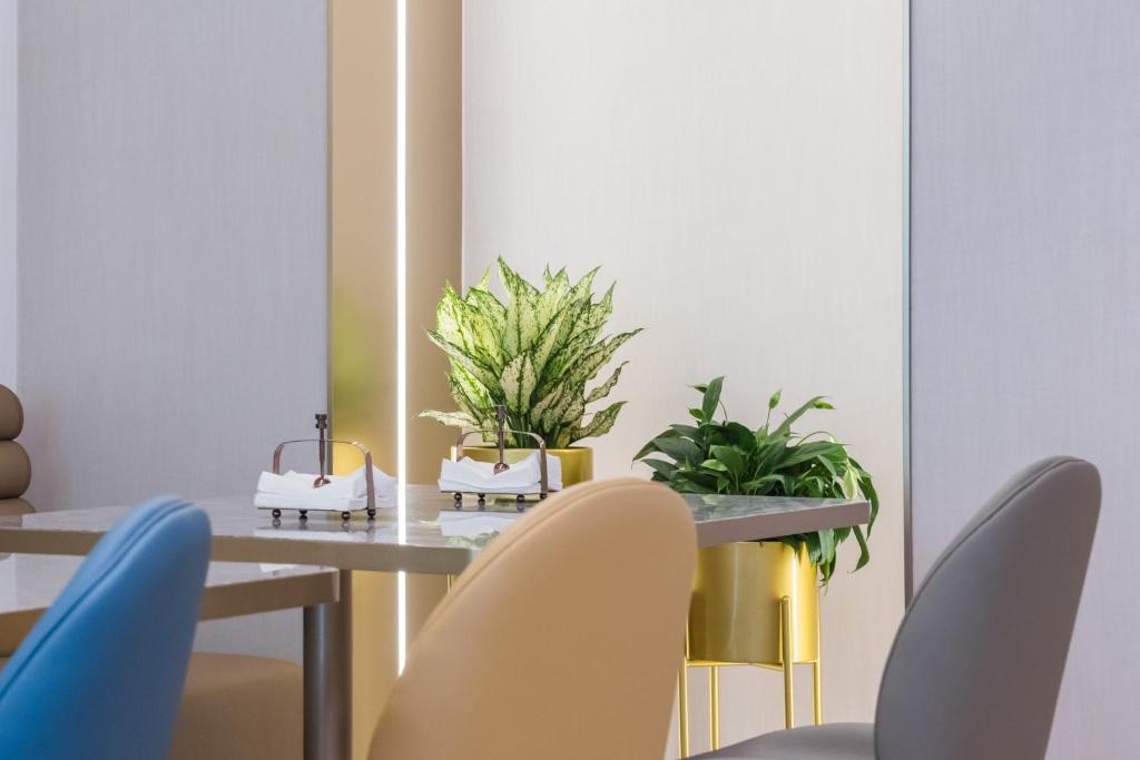 Posezení v ubytování Manxin Hotel Guangzhou Baiyun Airport Branch