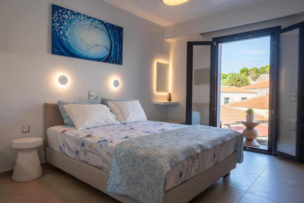 Posteľ alebo postele v izbe v ubytovaní Eressian Lodgings - Skala Eressos