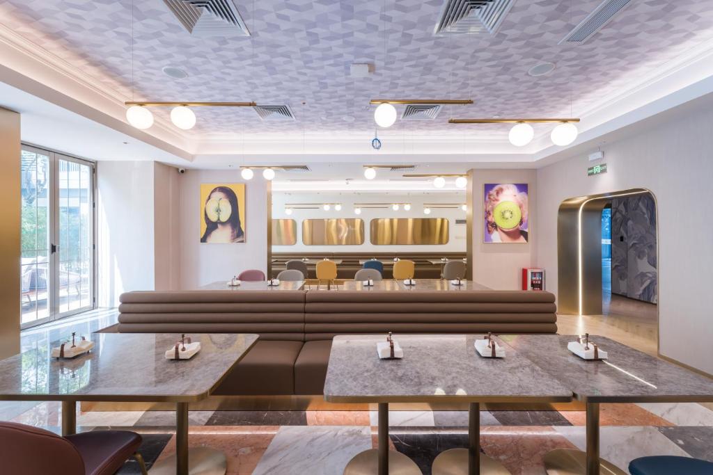 Posezení v ubytování Manxin Hotel Guangzhou Baiyun Airport Branch