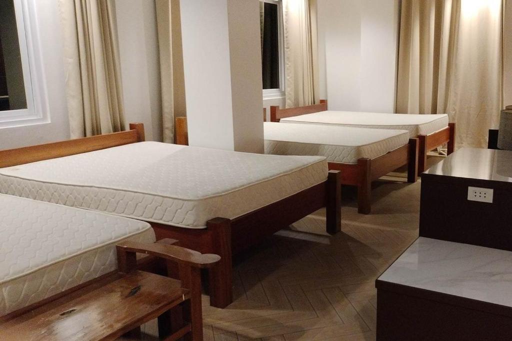 Postel nebo postele na pokoji v ubytování Hotel Lapira Vigan