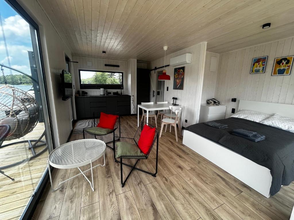 Voodi või voodid majutusasutuse Tiny House - Osada Wilkasy toas