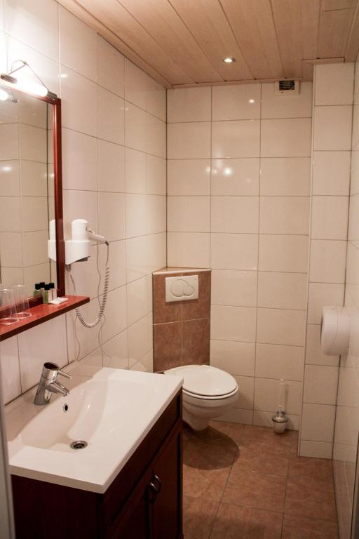 Koupelna v ubytování Hotel,cafe,biljart POT