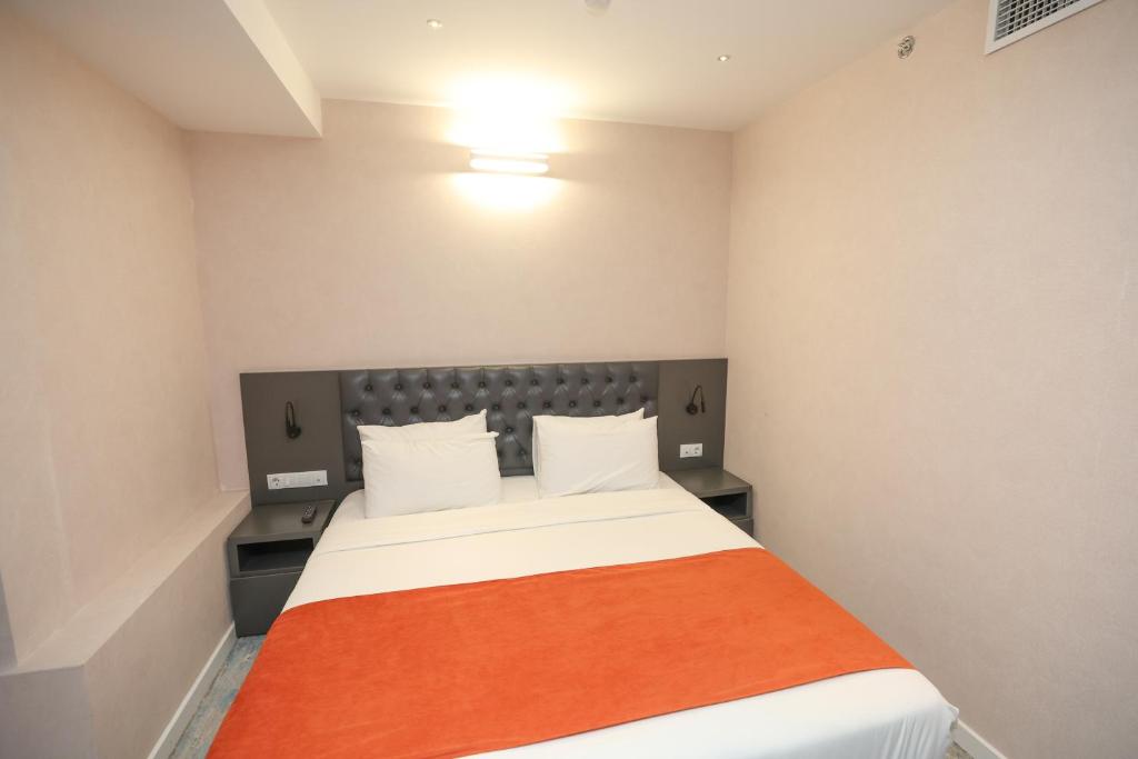 Postel nebo postele na pokoji v ubytování Hotel MTbilisi