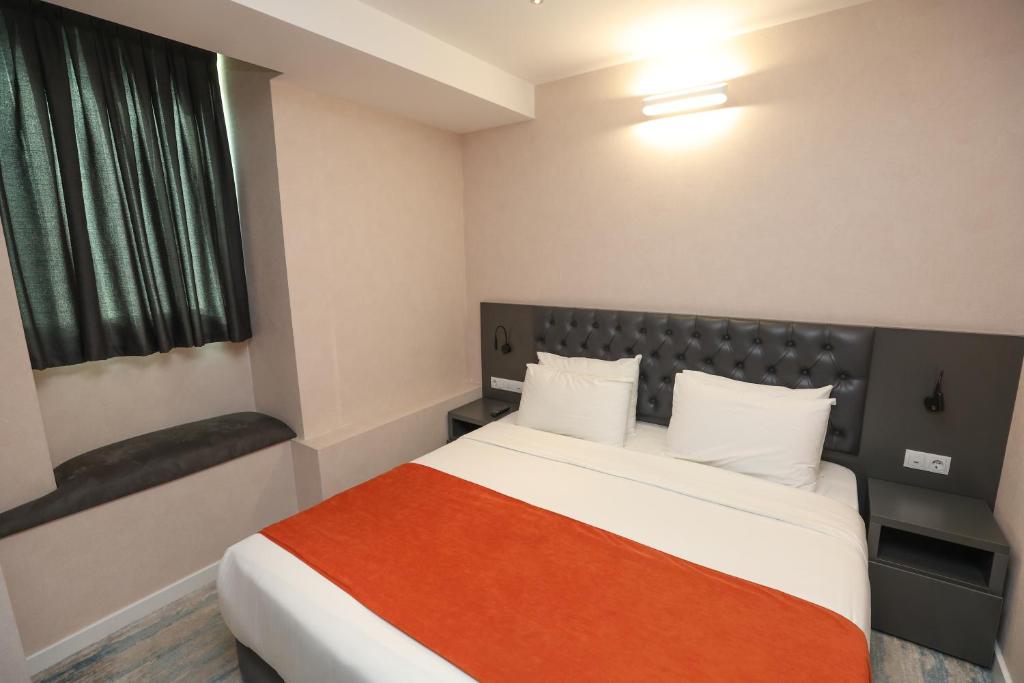 Postel nebo postele na pokoji v ubytování Hotel MTbilisi