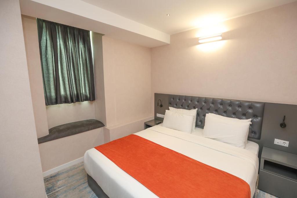 Postel nebo postele na pokoji v ubytování Hotel MTbilisi
