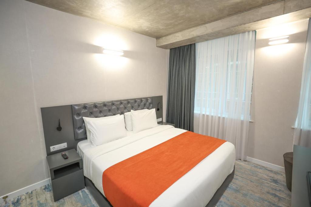 Postel nebo postele na pokoji v ubytování Hotel MTbilisi