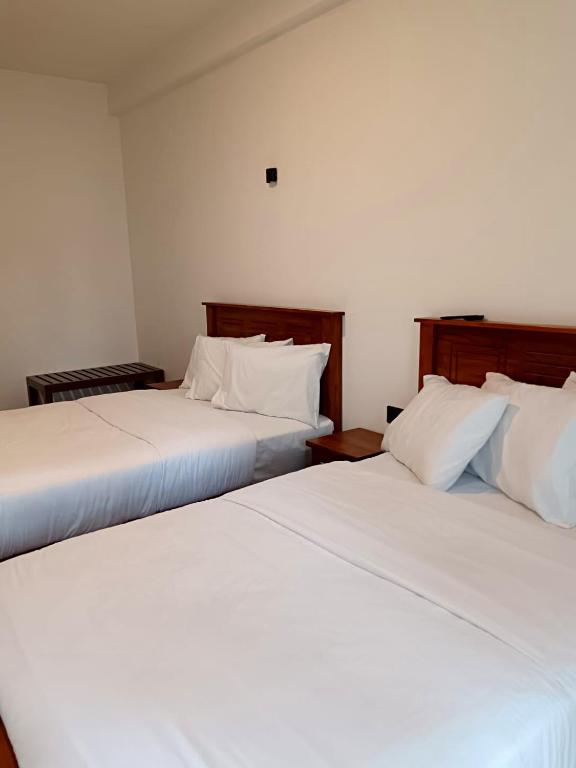 Postel nebo postele na pokoji v ubytování Havelock Inn