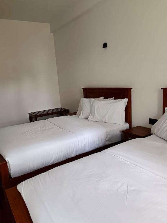 Postel nebo postele na pokoji v ubytování Havelock Inn