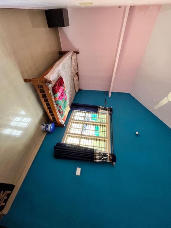 Postel nebo postele na pokoji v ubytování New Hambala Homestay