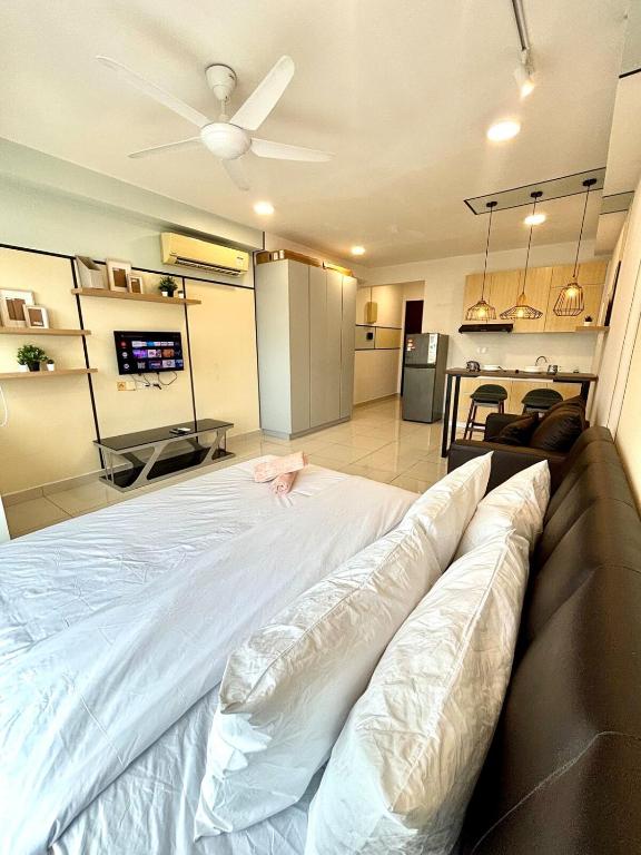 a large bed in a living room with a ceiling at KSL Modern Studio 1-2Pax #Daya#Austin#Ikea#Aeon in Johor Bahru