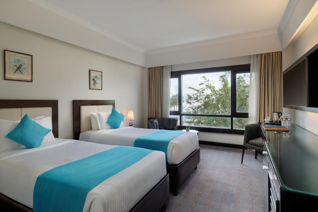 Postel nebo postele na pokoji v ubytování Hotel Himalaya
