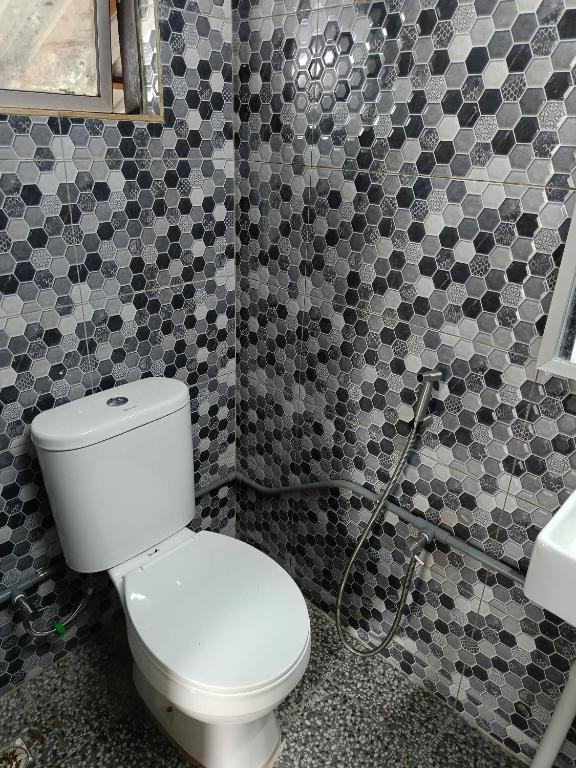 Koupelna v ubytování Rumah Kayu Masjid Zahir