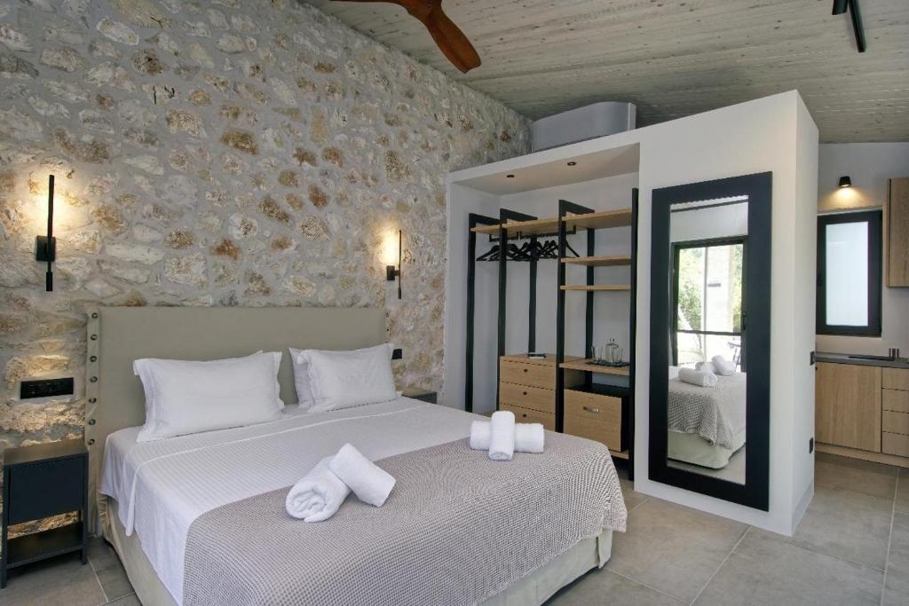 Postel nebo postele na pokoji v ubytování Paxoi Resort - Adult-Only