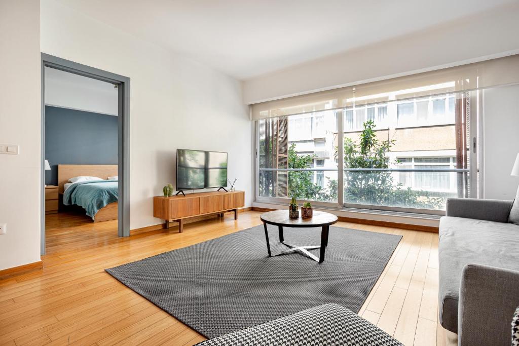 a living room with a couch and a table at NOA - Sungu 1 in Istanbul