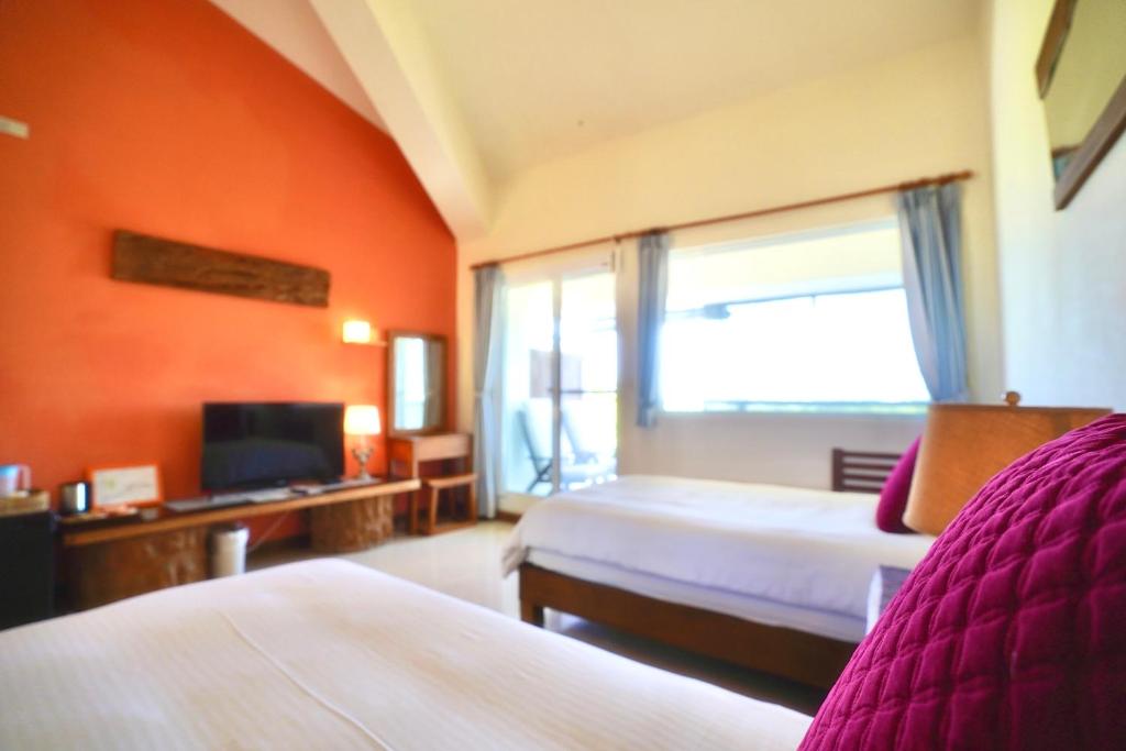 Kenting COMIC B&B&SPRING客房内的一张或多张床位