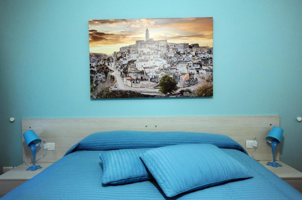 Letto o letti in una camera di amaranto bnb