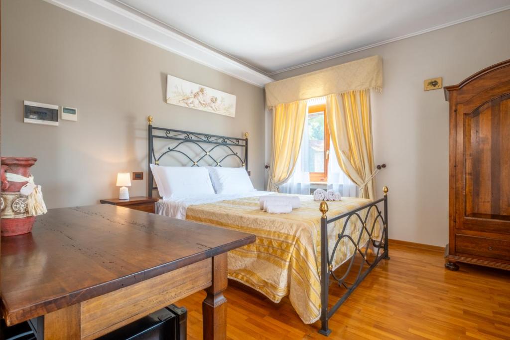 Postel nebo postele na pokoji v ubytování Agriturismo Beata Vanna