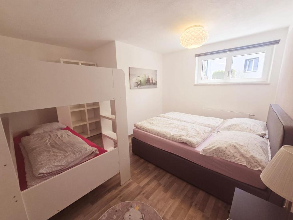 Postel nebo postele na pokoji v ubytování Apart Weinberg 1 - 6 Personen Ferienwohnung
