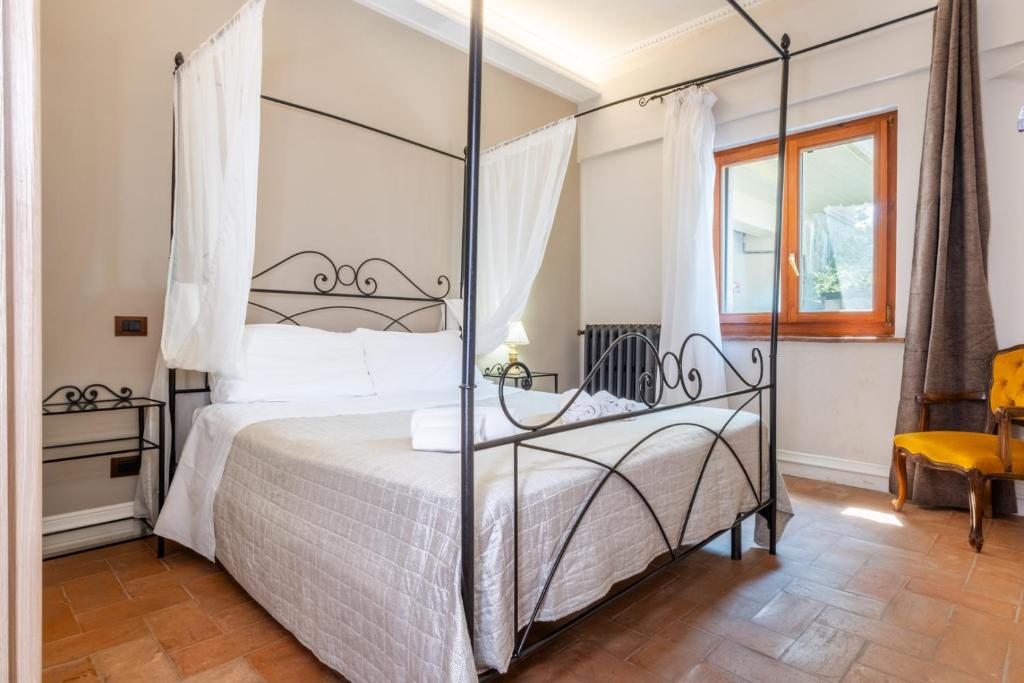 Postel nebo postele na pokoji v ubytování Agriturismo Beata Vanna