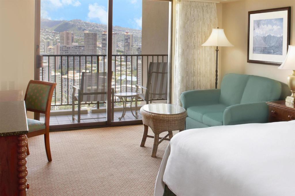 Postel nebo postele na pokoji v ubytování Hilton Hawaiian Village Waikiki Beach Resort