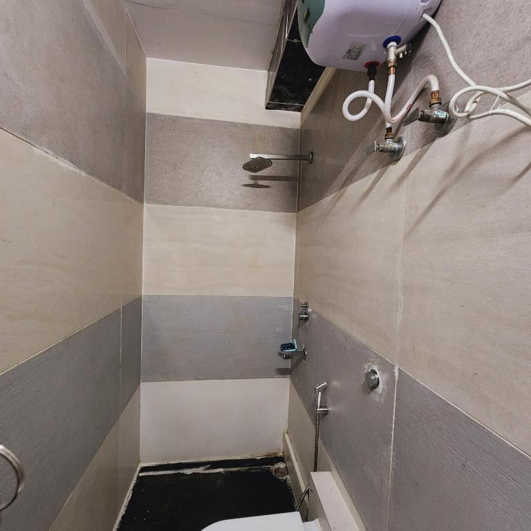 Koupelna v ubytování HOTEL ROYAL AFGHAN