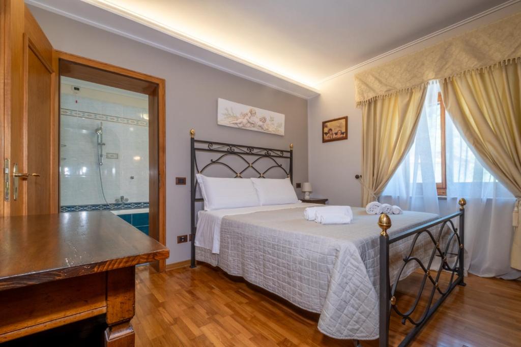 Postel nebo postele na pokoji v ubytování Agriturismo Beata Vanna