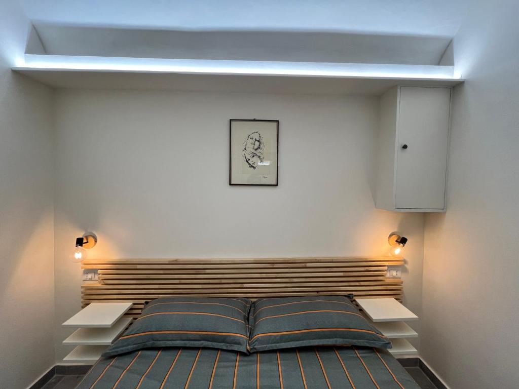 Postel nebo postele na pokoji v ubytování Suite San Domenico - Host by Traveller's Nest