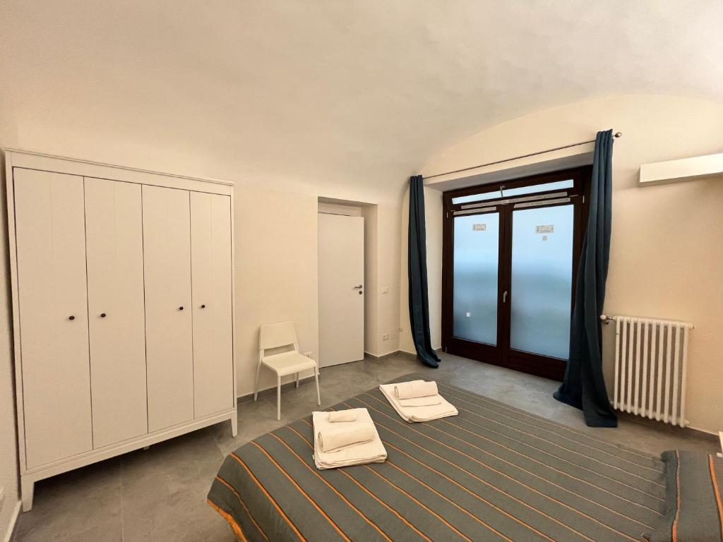Postel nebo postele na pokoji v ubytování Suite San Domenico - Host by Traveller's Nest