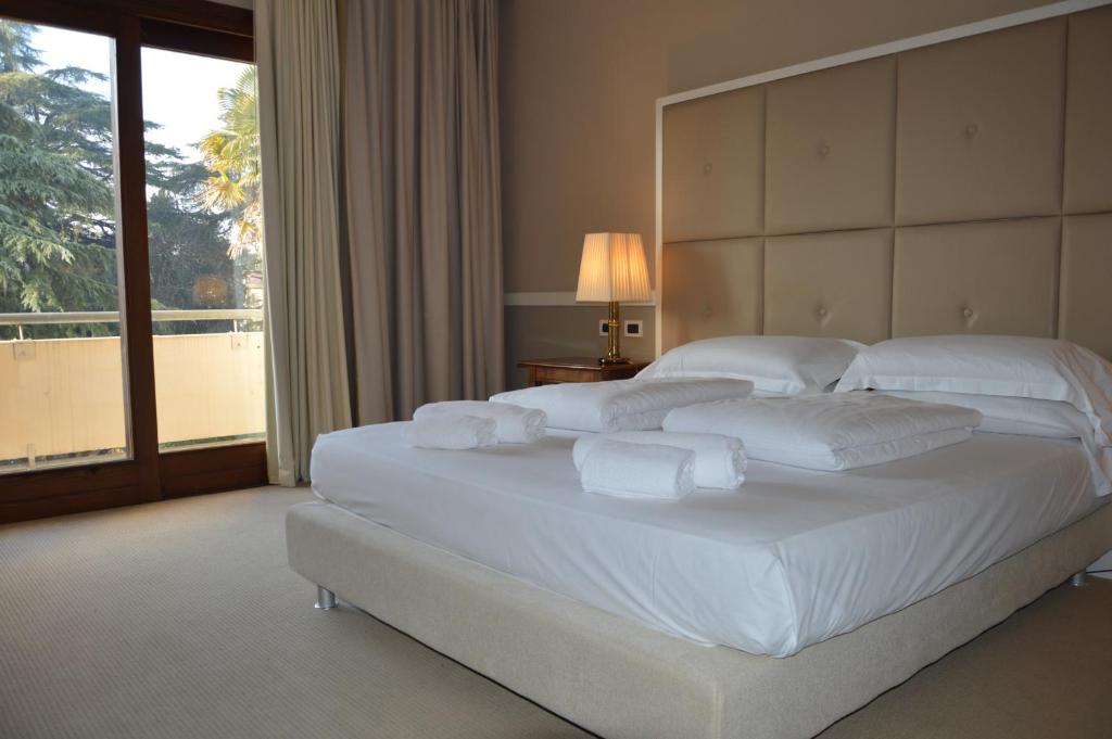 Postel nebo postele na pokoji v ubytování Blue Dream Hotel