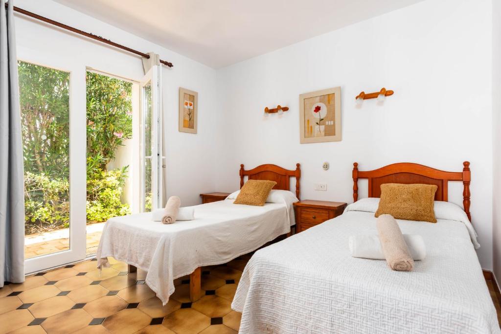 Postel nebo postele na pokoji v ubytování Villa Castellet