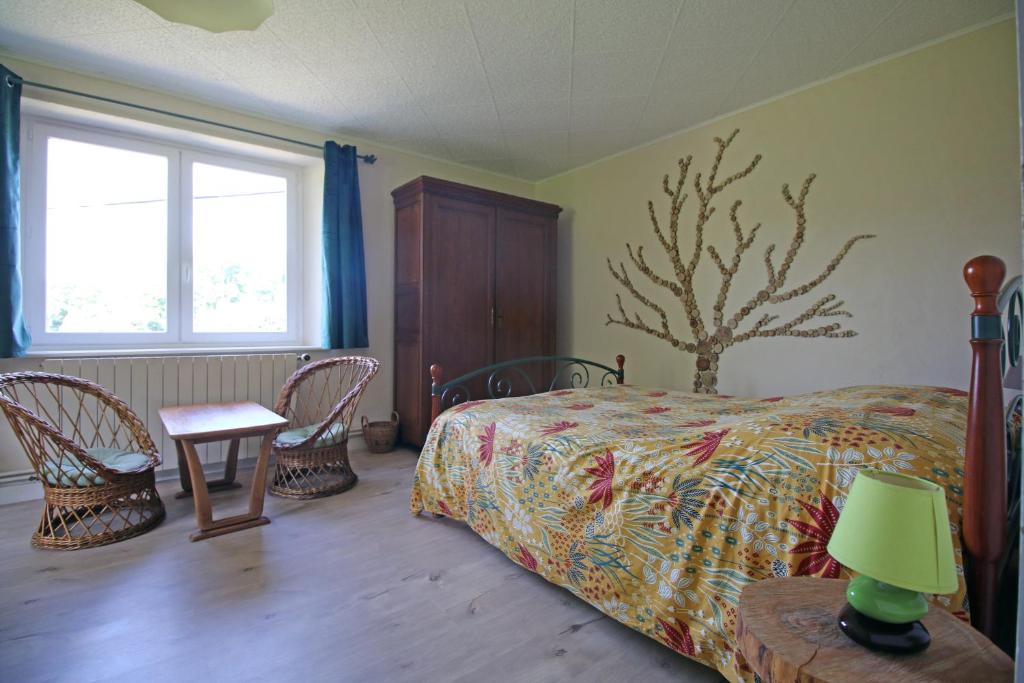 Postel nebo postele na pokoji v ubytování Ô2J