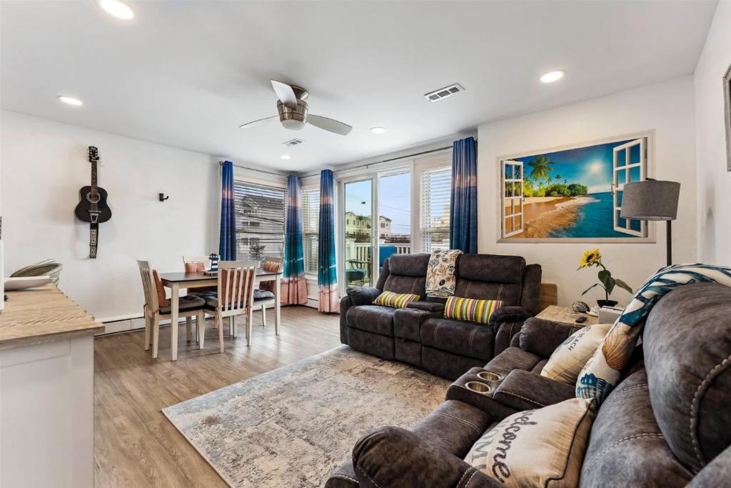 a living room with a couch and a table at 307 E Crocus Rd, Unit B in Wildwood Crest