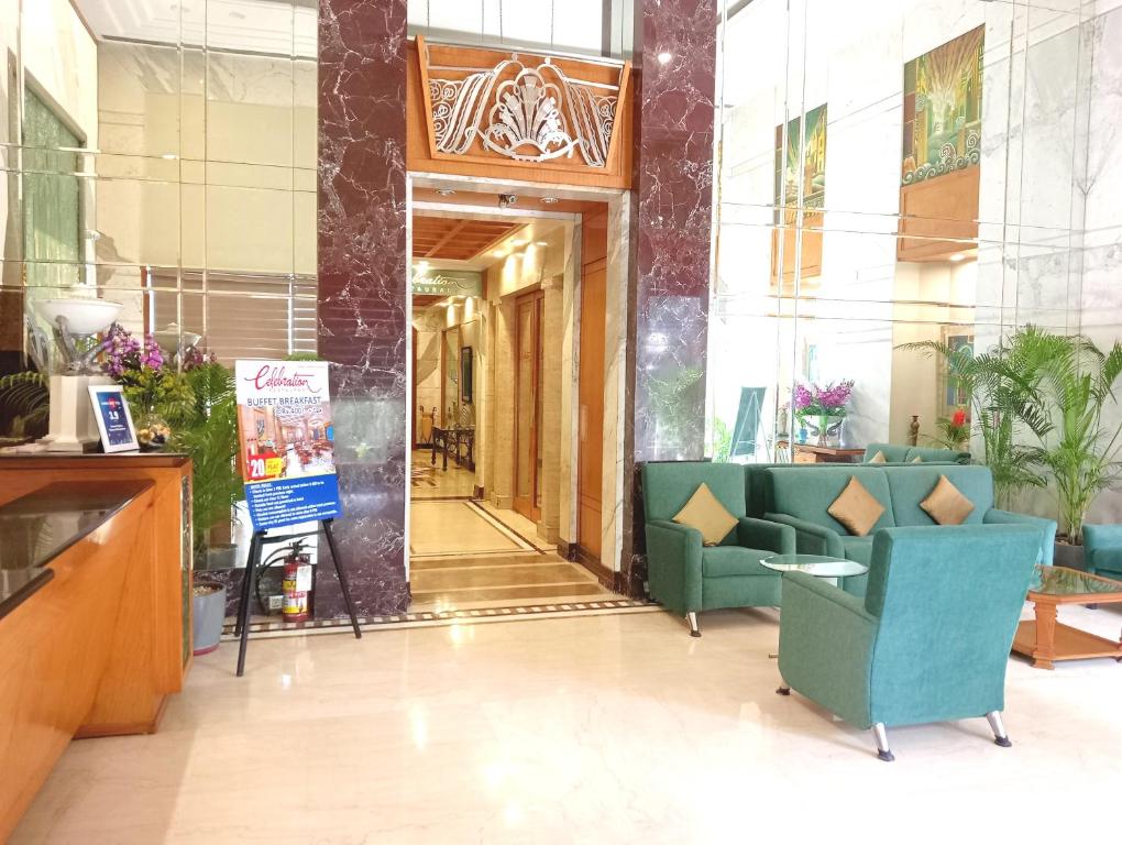 TV a/nebo společenská místnost v ubytování Sarovar Portico Kalupur Ahmedabad
