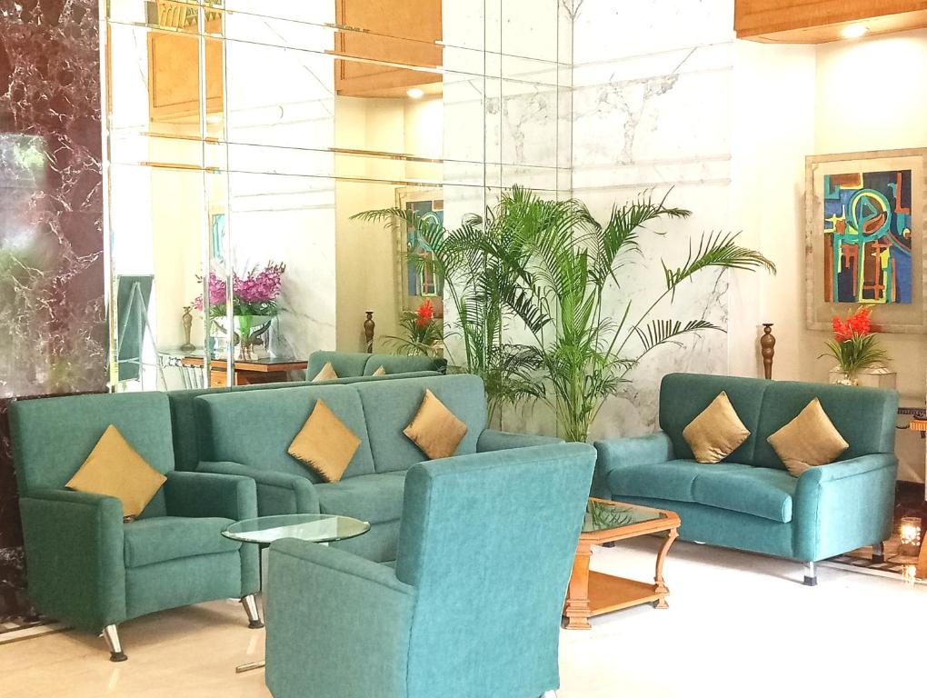 Posezení v ubytování Sarovar Portico Kalupur Ahmedabad