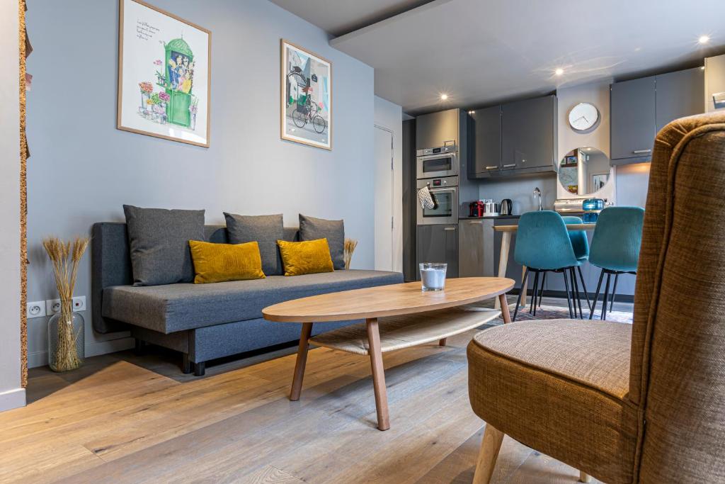 Kuchyňa alebo kuchynka v ubytovaní Les Appartements Cardinet