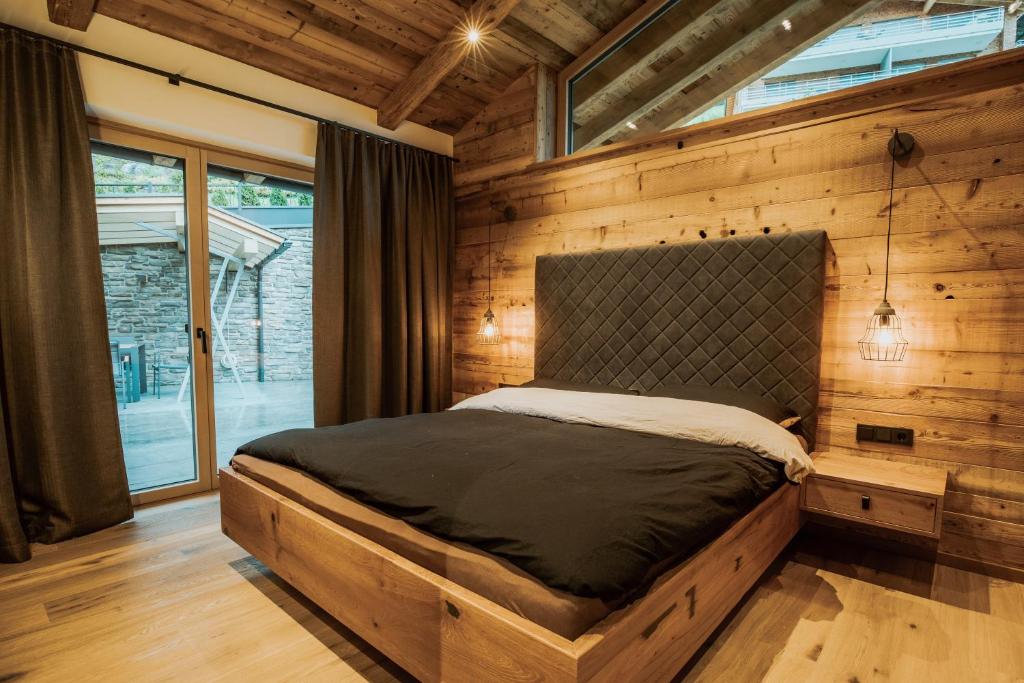 Postel nebo postele na pokoji v ubytování Rufana Alpin