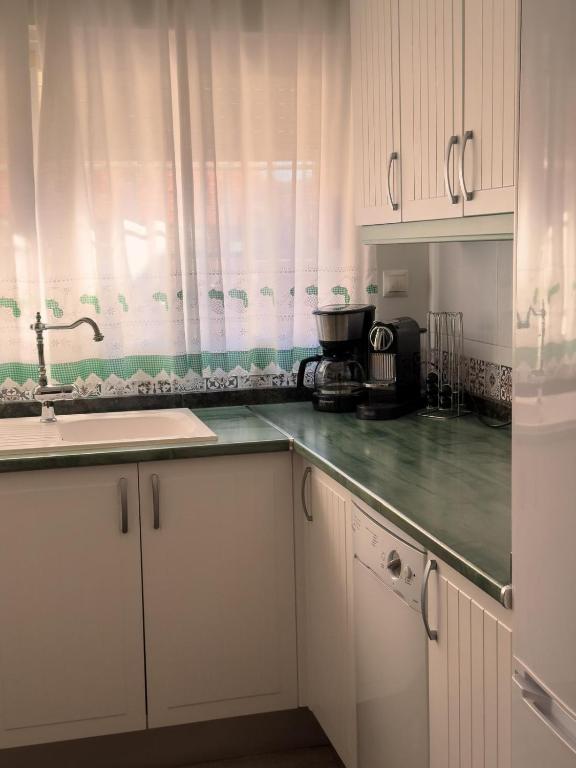 Kuchyň nebo kuchyňský kout v ubytování La casita de lola