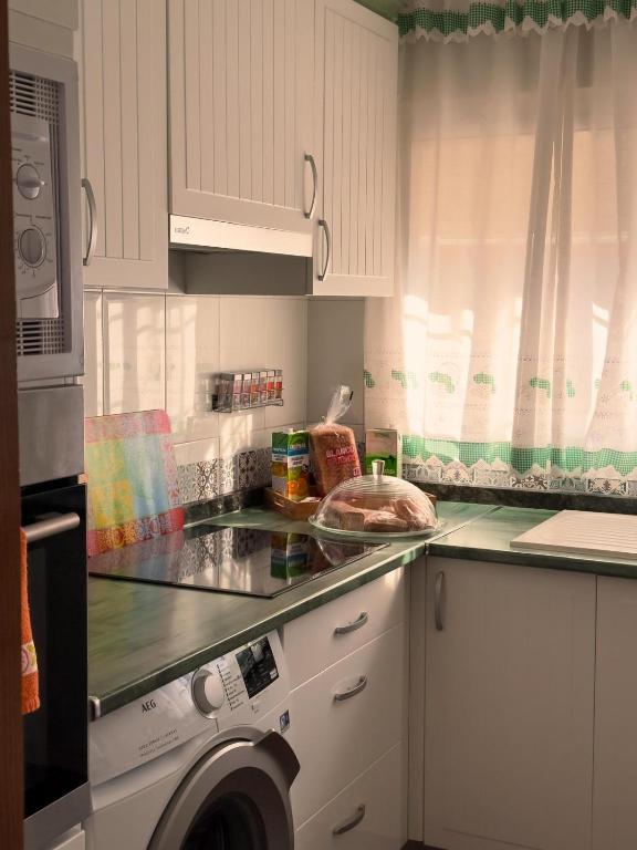 Kuchyň nebo kuchyňský kout v ubytování La casita de lola