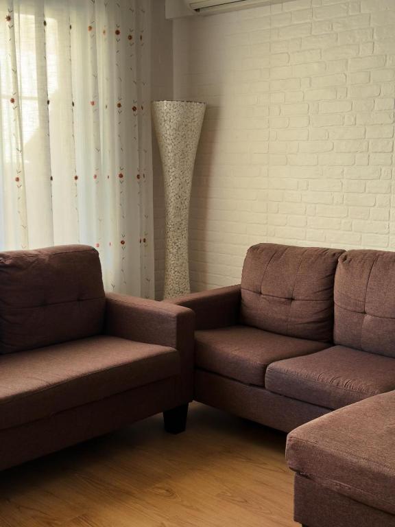 Posezení v ubytování La casita de lola